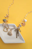 Gold Charm Necklace | Bow Checker Heart