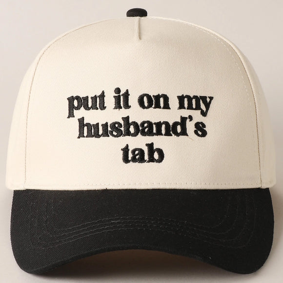 Put It On My Husband's Tab Trucker Cap | Black