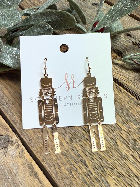 Shiny Metal Nutcracker Earrings | Gold
