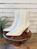 The Gaia Pointed Toe Block Heel Bootie | White