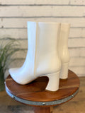 The Gaia Pointed Toe Block Heel Bootie | White