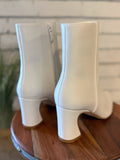 The Gaia Pointed Toe Block Heel Bootie | White