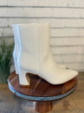 The Gaia Pointed Toe Block Heel Bootie | White